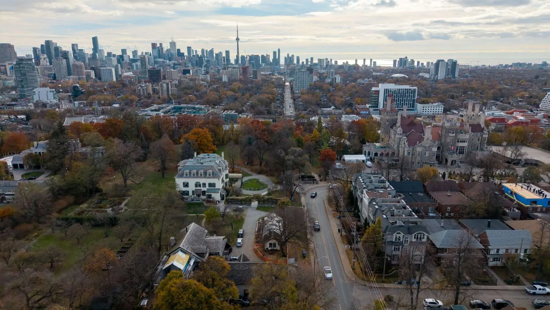 Aerial view over the Spadina Museum grounds toward the Toronto skyline