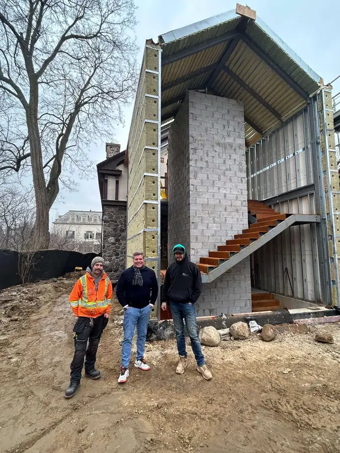 The team on site in front of the home