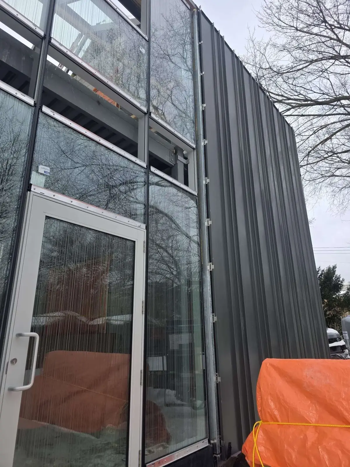 Black standing-seam metal cladding on a modern downtown Toronto home